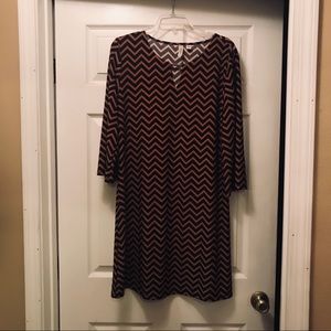 Tacera Chevron Print Dress with gold accent bar.